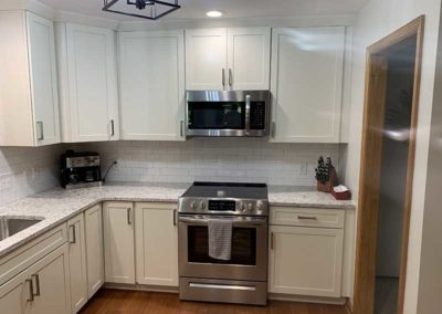 New stove and kitchen cabinets installed by Mountaineer Kitchens and Baths