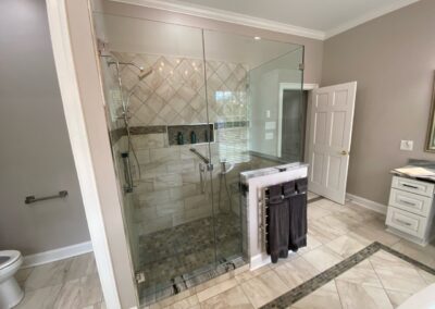 Shower with glass pane sides installed by Mountaineer Kitchens & Baths