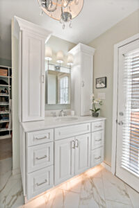 white bathroom vanity with custom cabinets